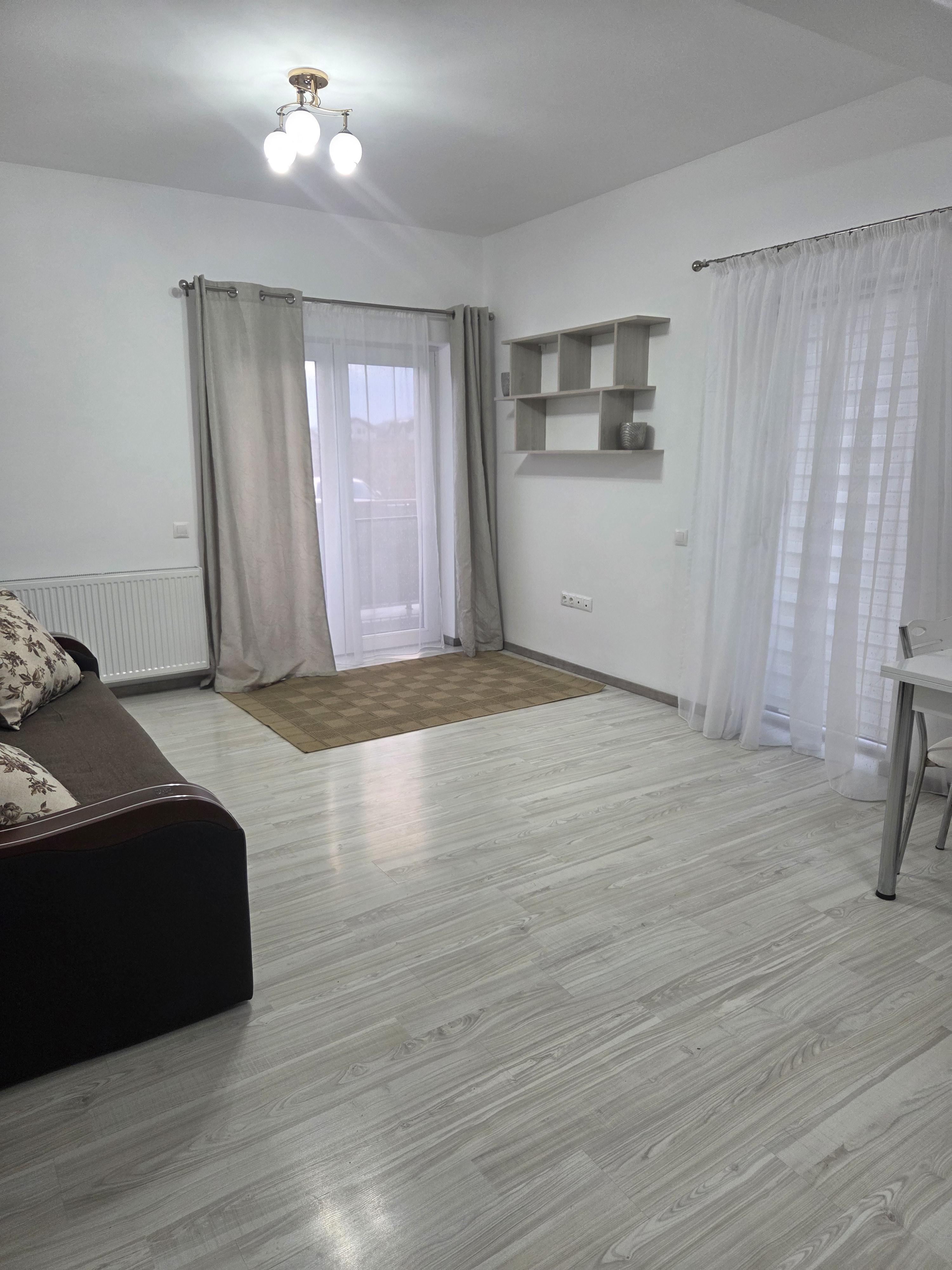 De vanzare Unirii,apartament cu 2 camere,parter,open space,mobilat si utilat,bloc nou, cu loc de parcare inclus