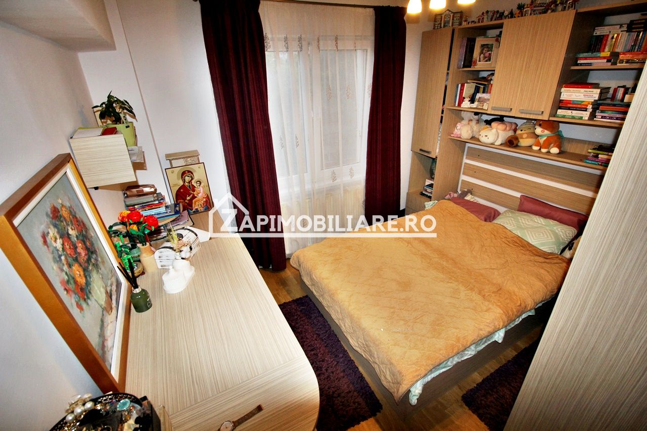 Apartament 3 camere,2 bai,pivnită,70mp,cartier Tudor,mobilat — fotografia 2