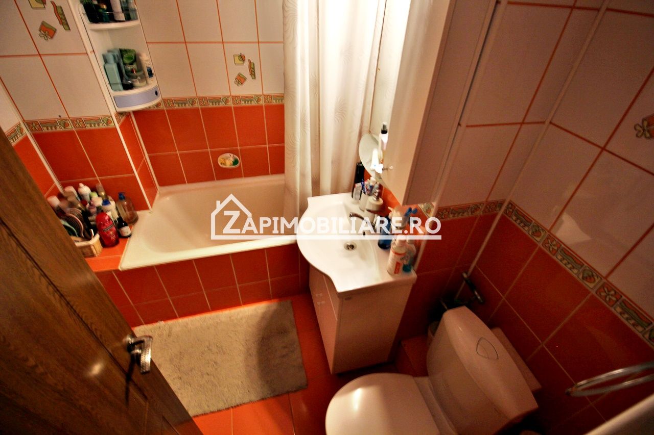 Apartament 3 camere,2 bai,pivnită,70mp,cartier Tudor,mobilat — fotografia 5