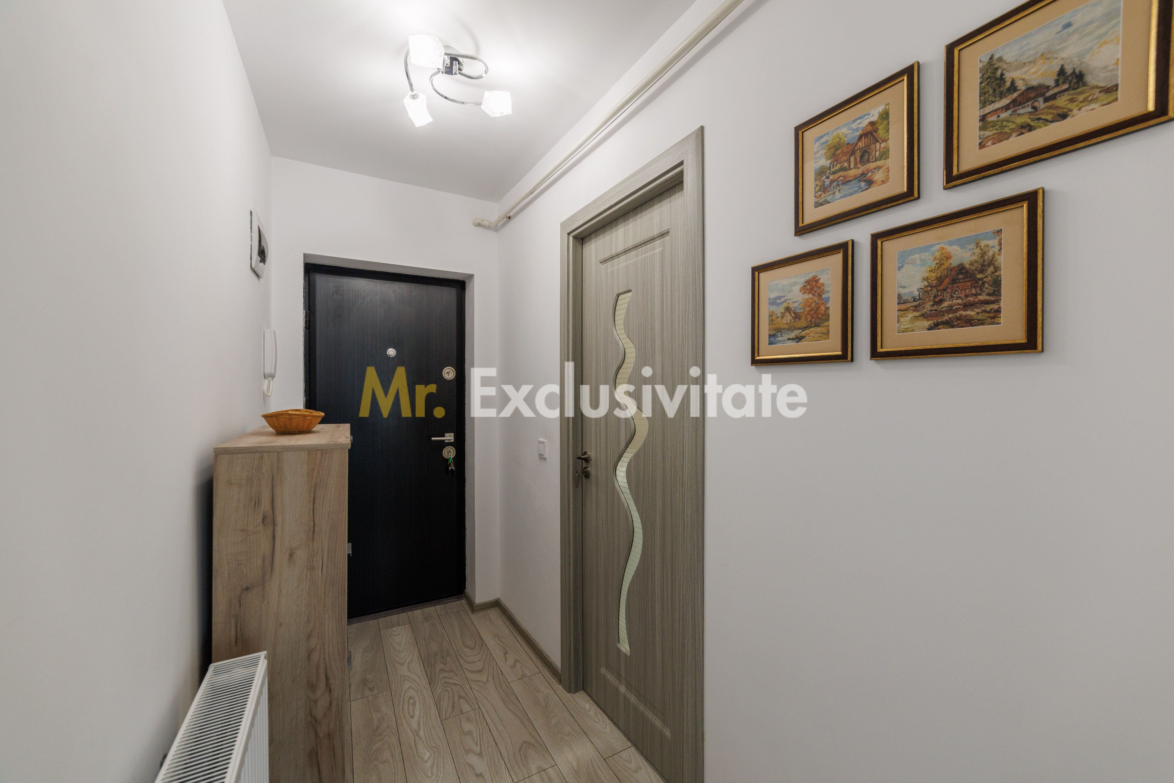 Garsonieră modernă la etajul 1 într-un bloc din 2021 — fotografia 5