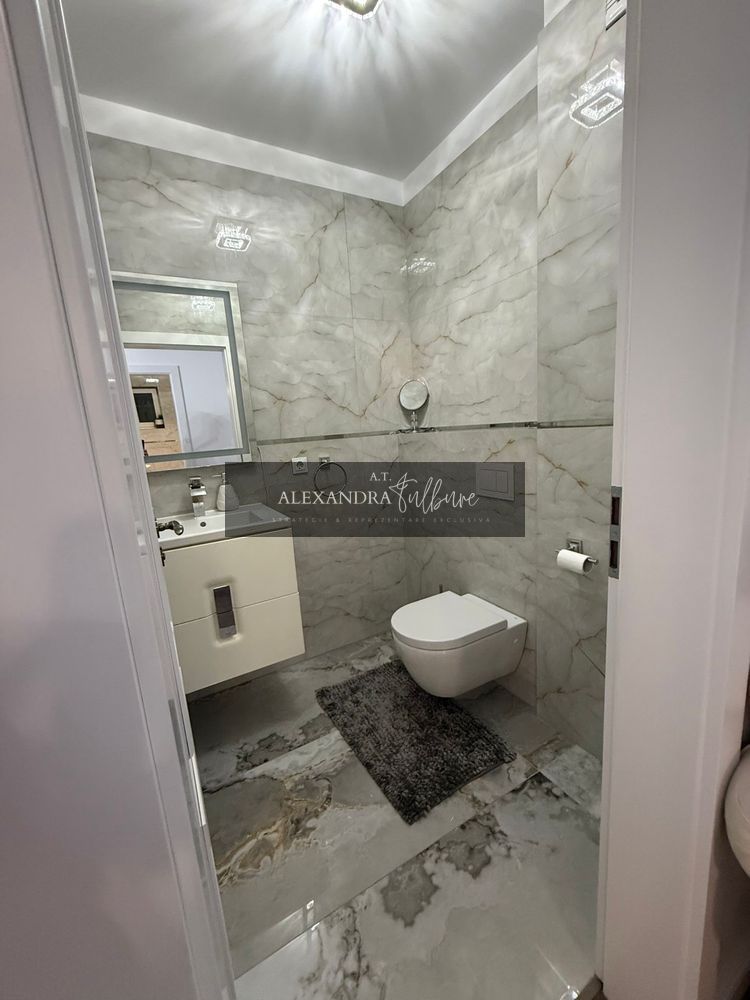 Apartament 3 camere decomandate, 2 bai,balcon, etaj intermediar, garaj — fotografia 8