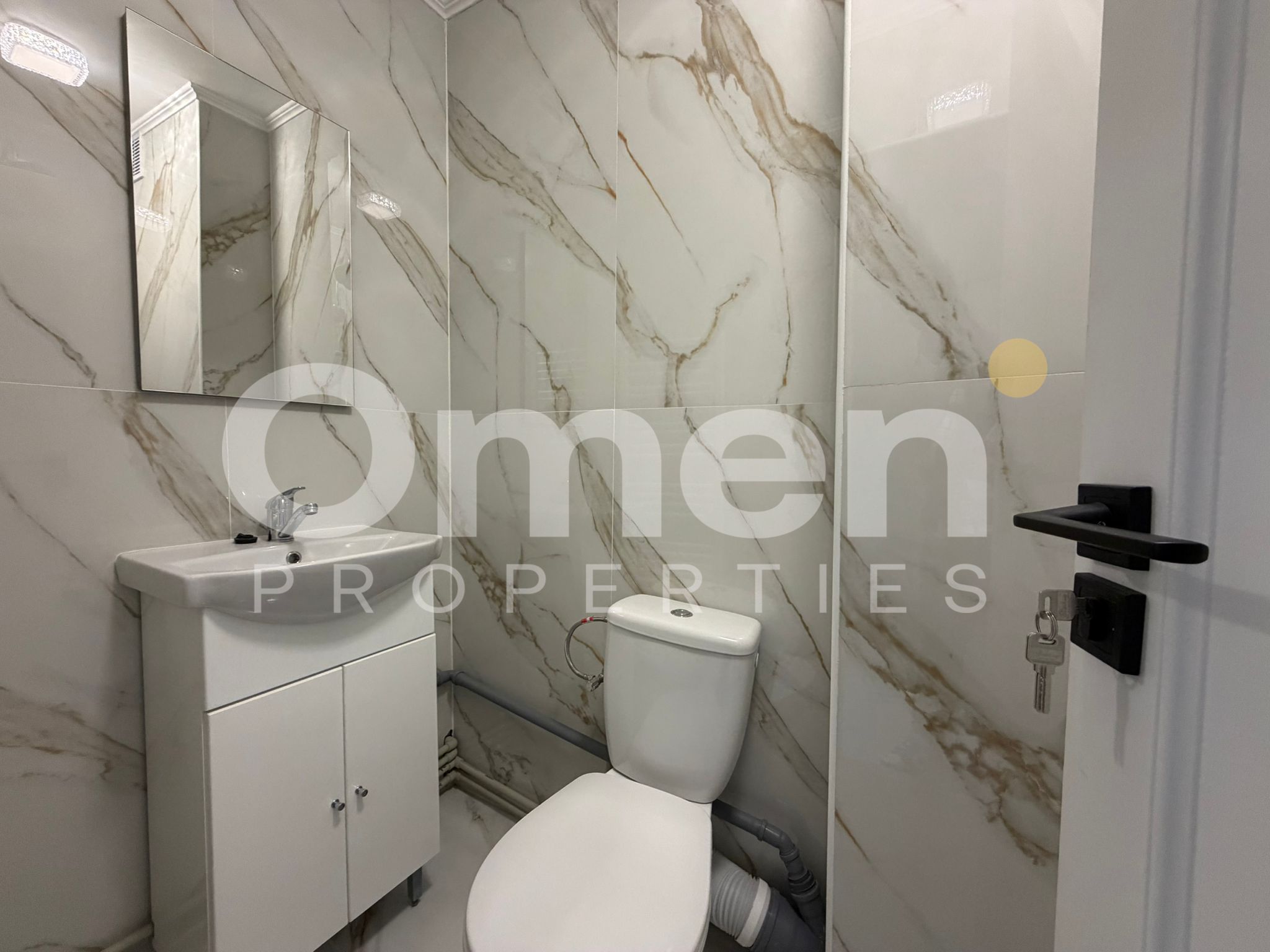 Garsoniera renovata, etaj intermediar, zona Pietei Izvoare — fotografia 4