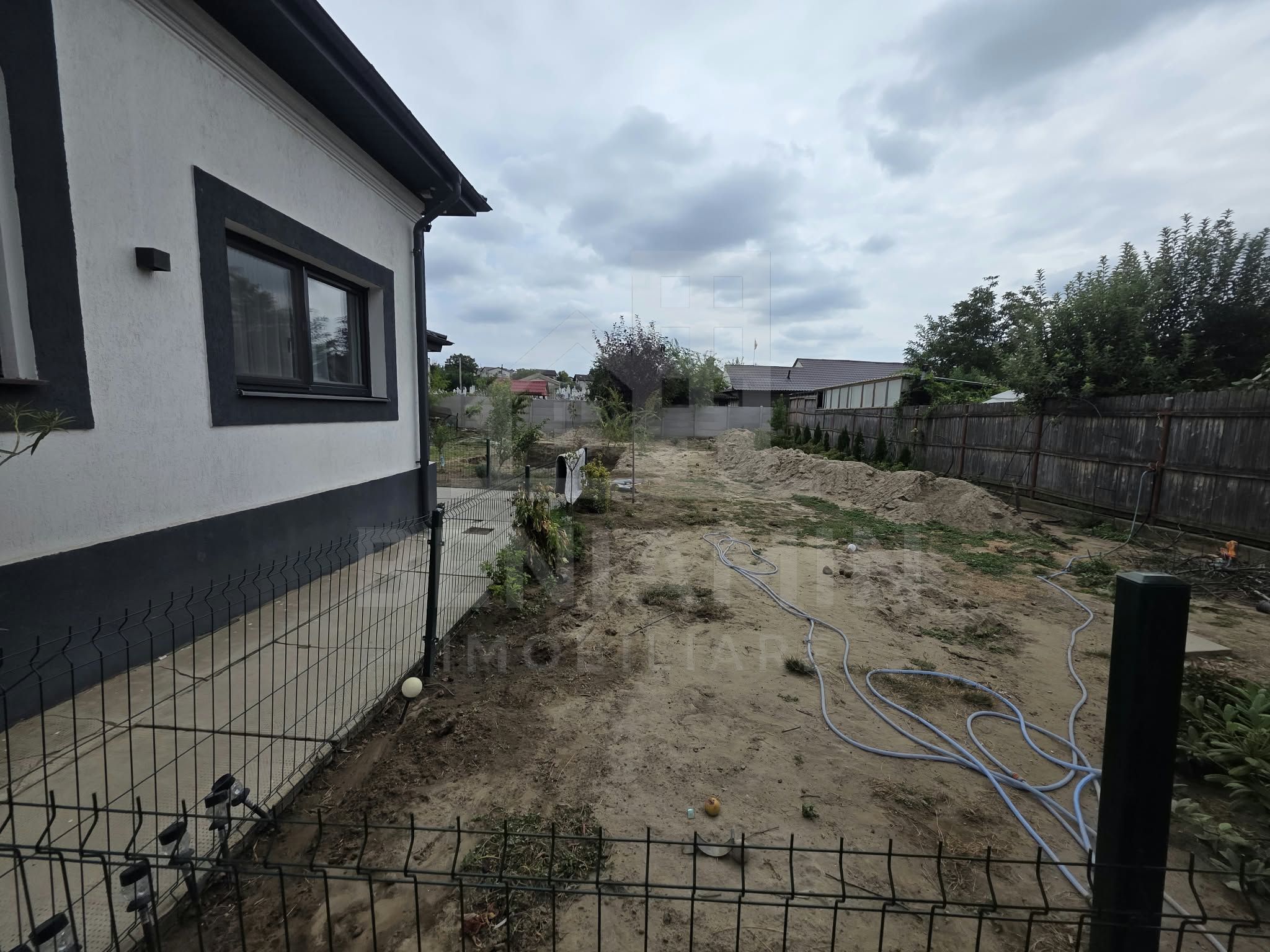 Casa de vanzare in Romanesti cu teren 1200mp mobilata utilata — fotografia 17
