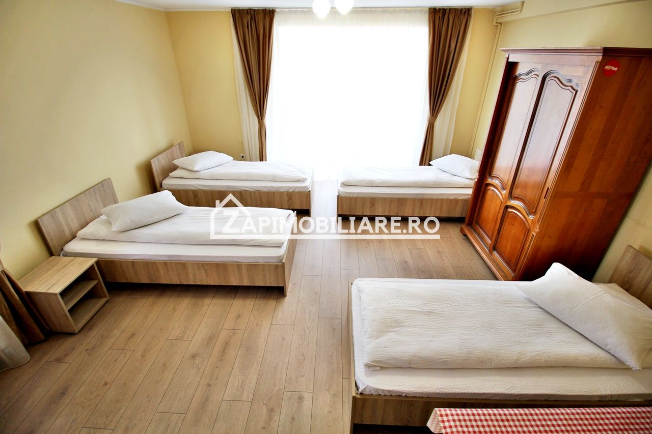 Casa 4 camere,4 bai,1 bucatarie,1 living,120 mp,500mp teren