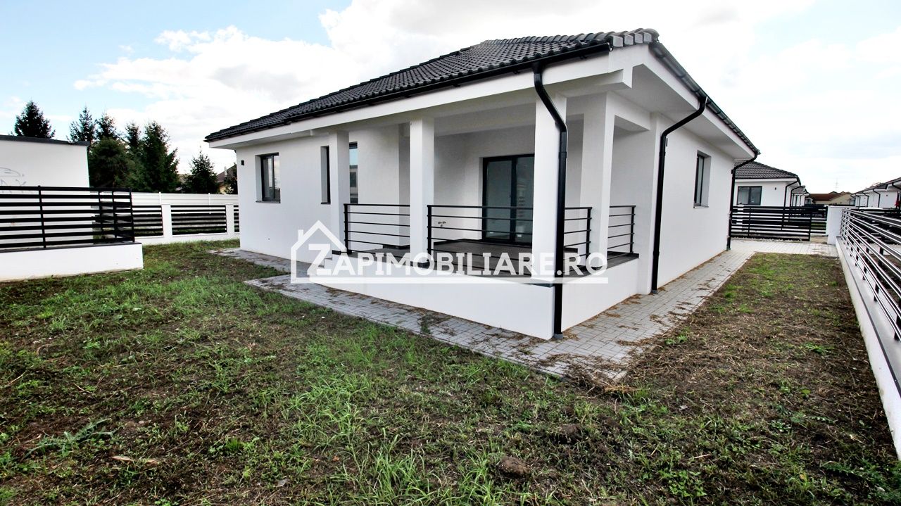 Casă la cheie pe 1 nivel 4 camere 2 băi,145 mp,500 mp teren — fotografia 2