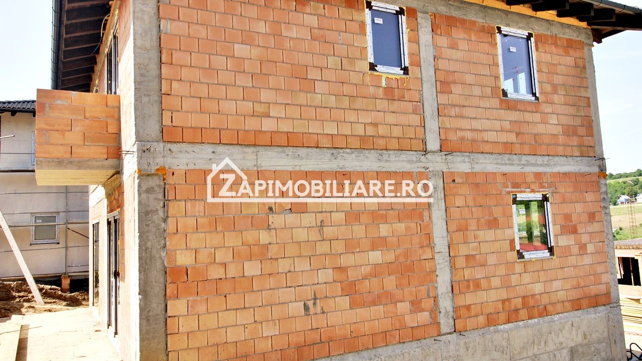 Casa  4 camere,2 bai,136 mp, 550 mp teren zona Corunca — fotografia 8