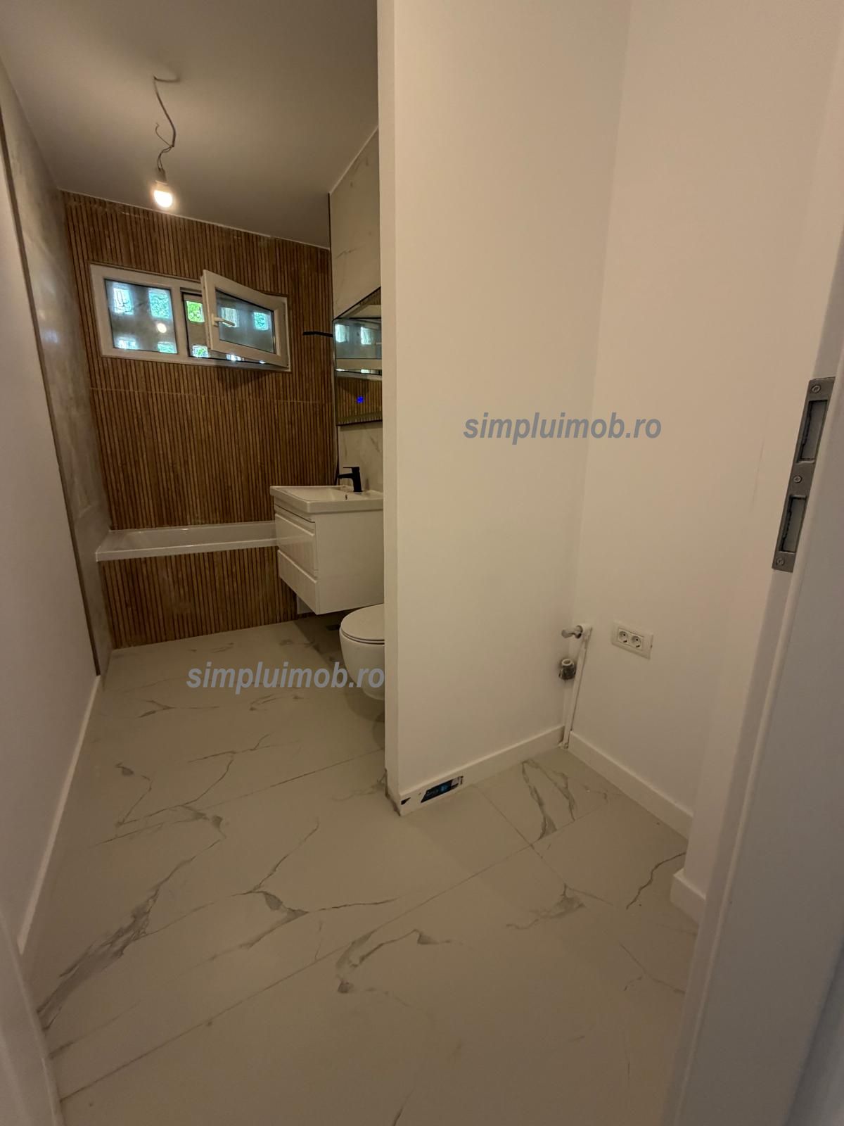 Metrou Titan renovat complet 3 camere — fotografia 12