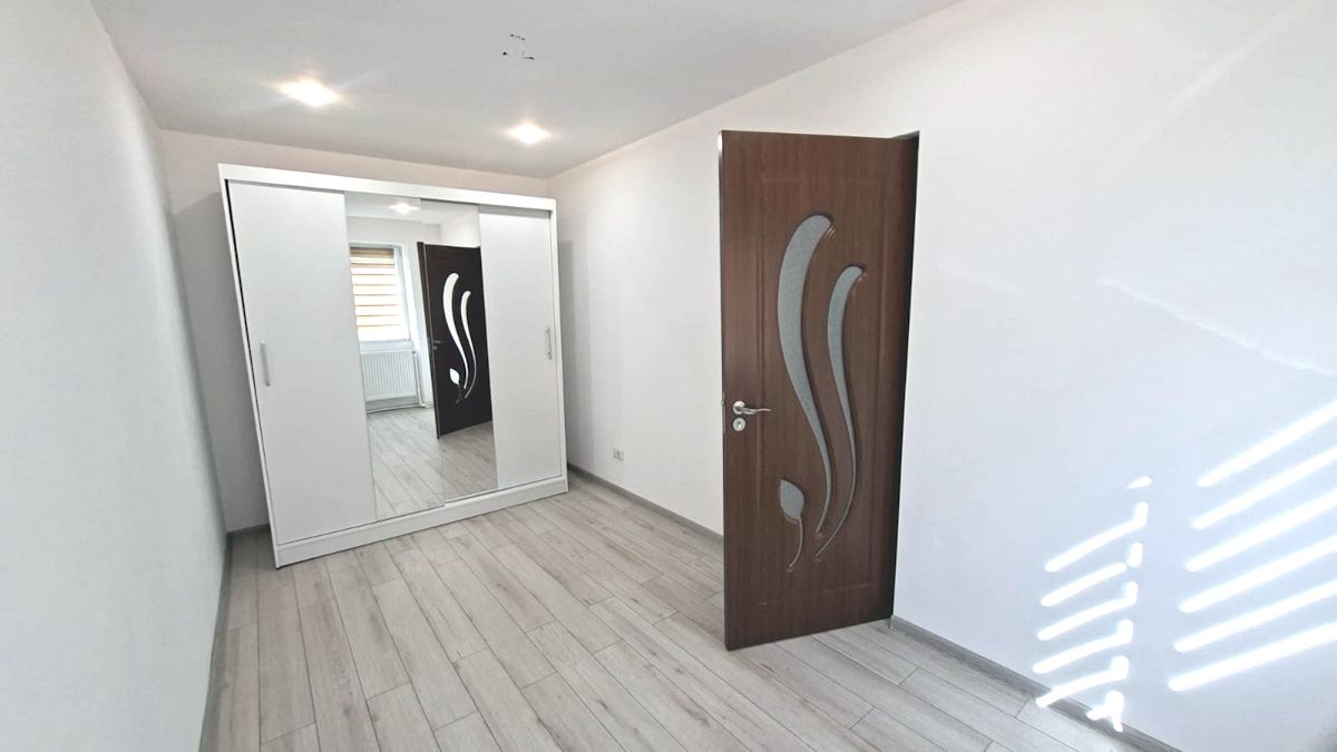 Apartament cu 2 camere, complet renovat, în zonă centrală din Tecuci — fotografia 7