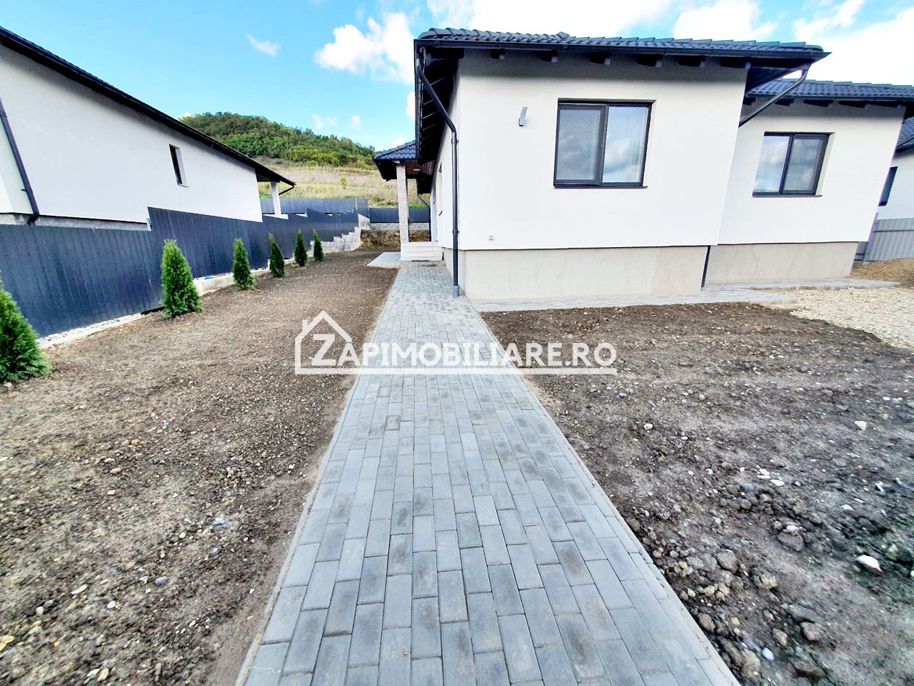 Casă la cheie pe 1 nivel 4cam. 2 bai,1 dresing 650 mp. teren — fotografia 18