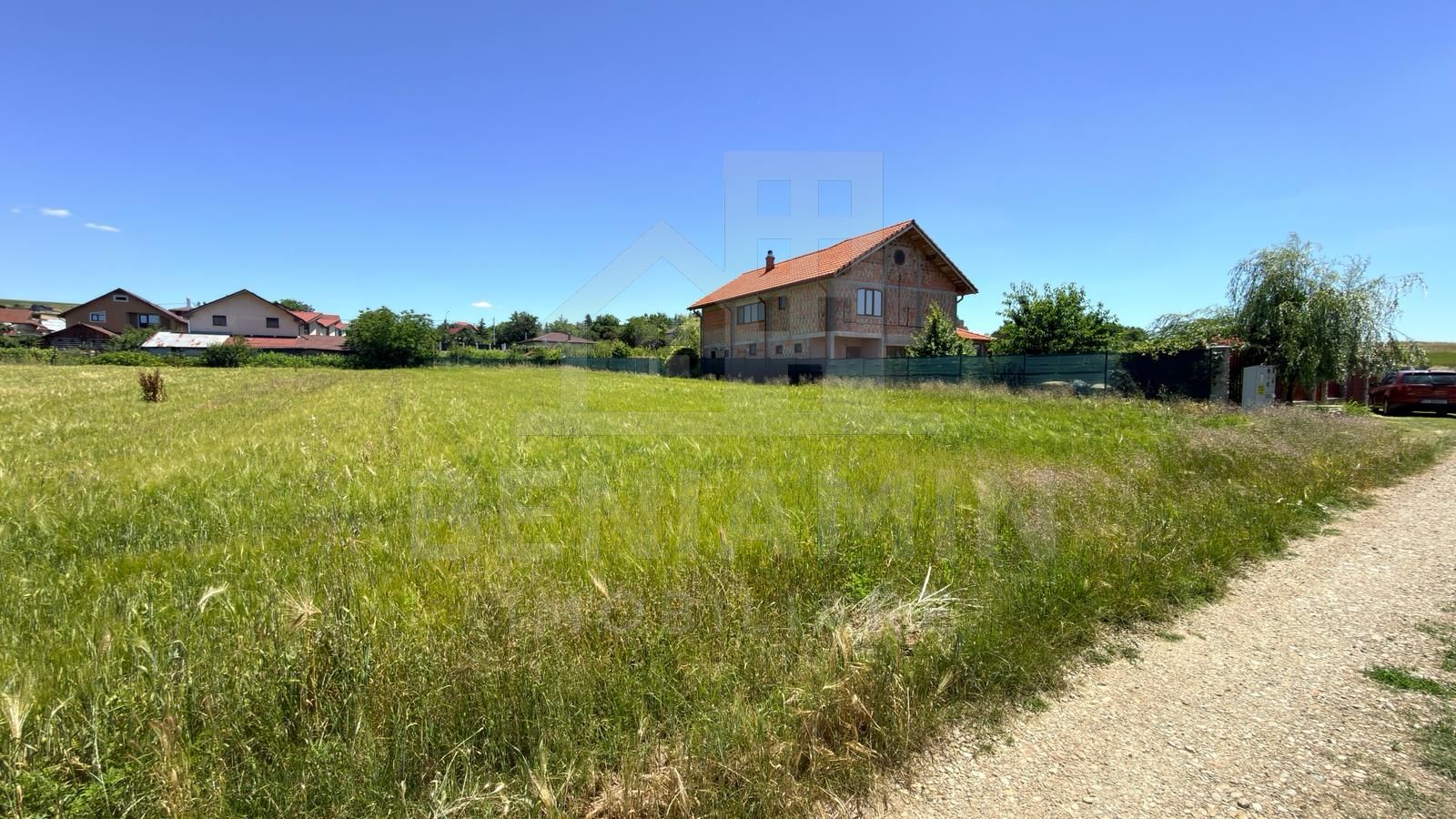 Vand-Teren-Intravilan-1.200-mp-Comuna-Izvoare — fotografia 3