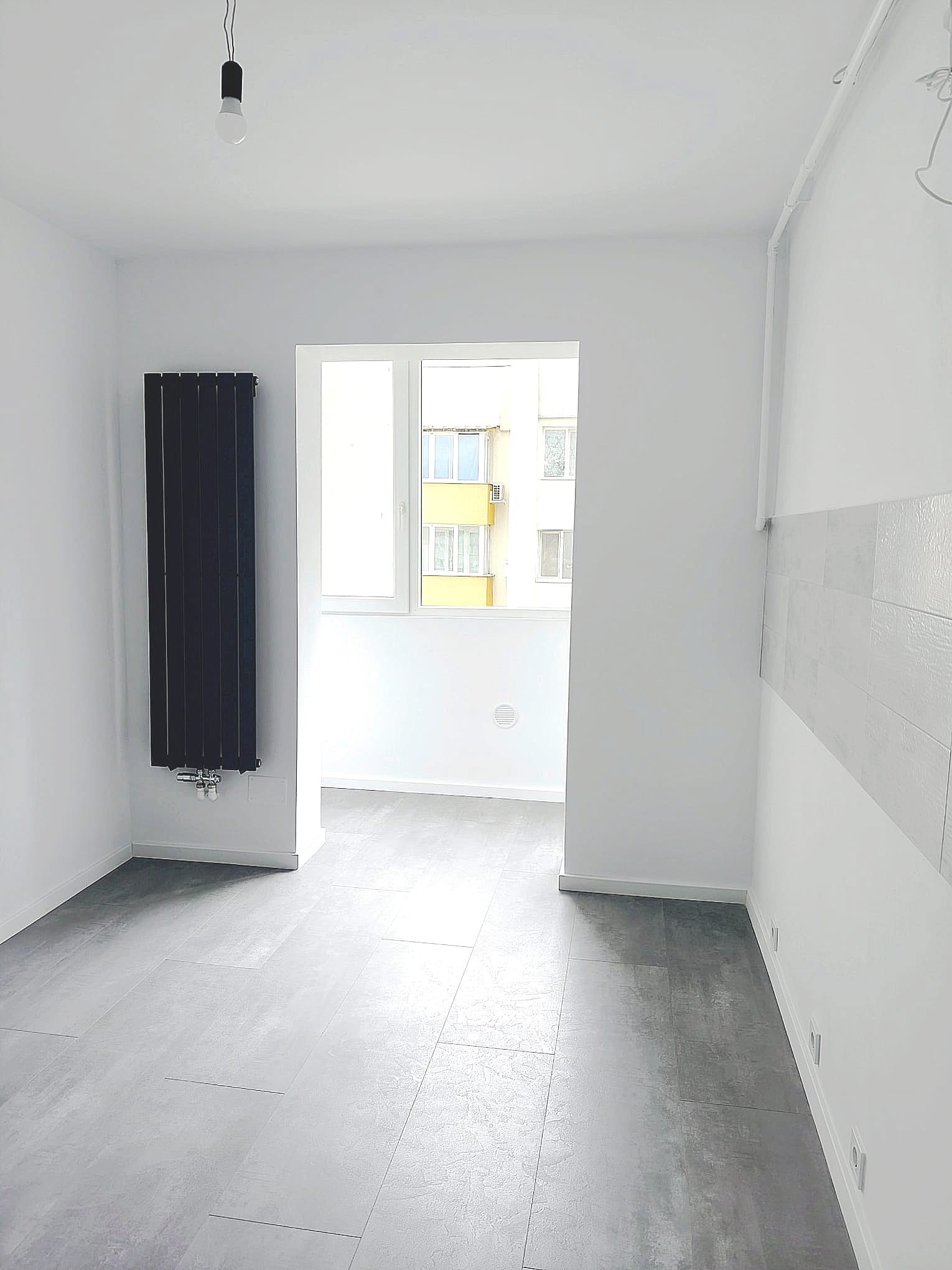 Apartament ultrafinisat, complet renovat, situat în centrul orașului.