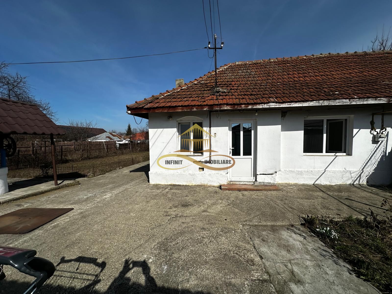 Casa batraneasca cu 800 mp teren de vanzare in Tache / Bacau — fotografia 3