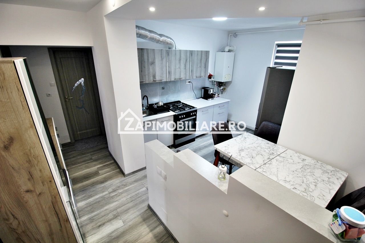 Apartament 2camere,mobilat si utilat,2balcoane,pivnită,garaj — fotografia 3