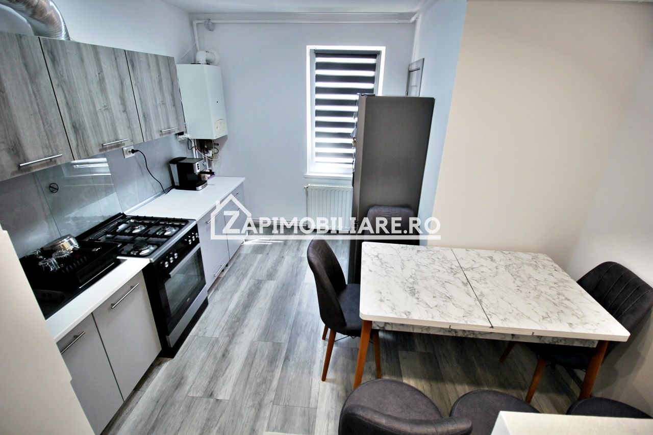 Apartament 2camere,mobilat si utilat,2balcoane,pivnită,garaj — fotografia 4
