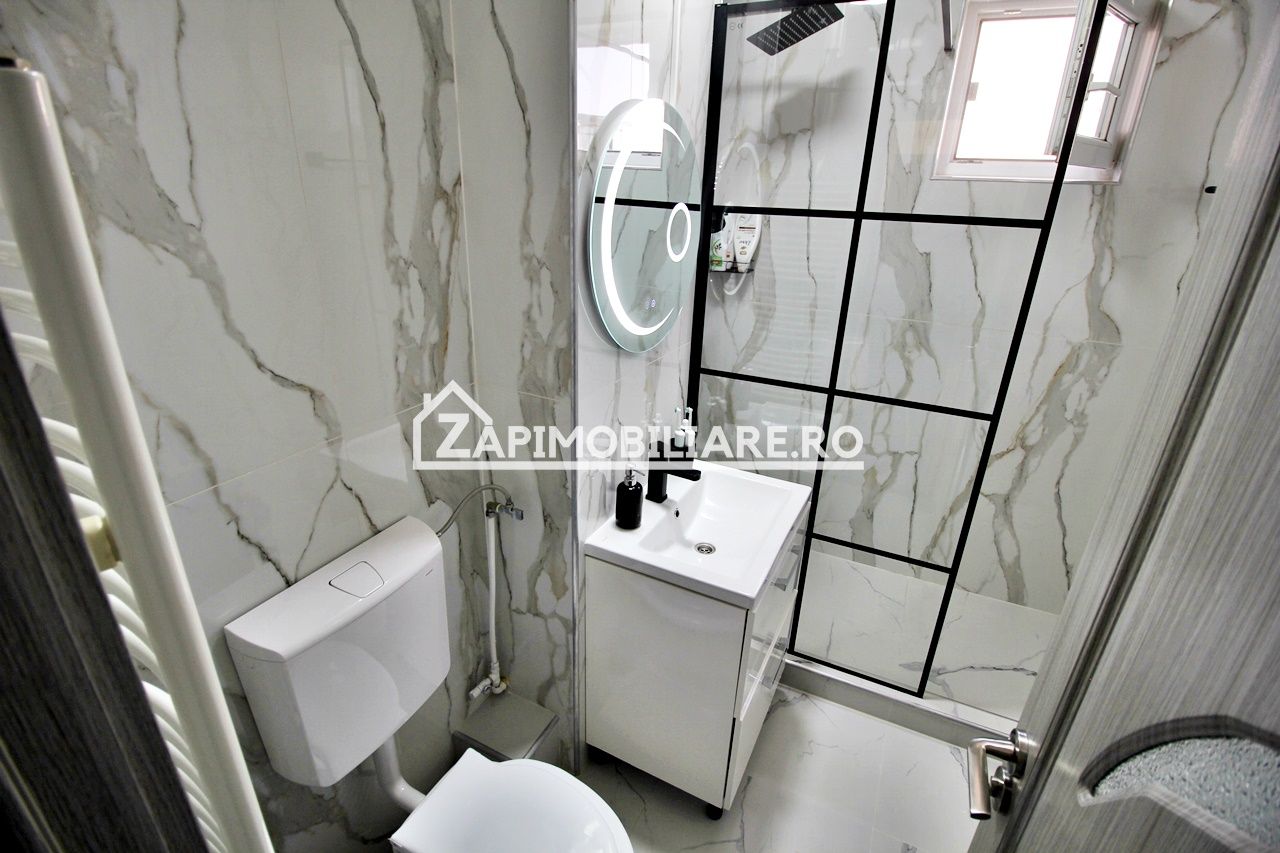 Apartament 2camere,mobilat si utilat,2balcoane,pivnită,garaj — fotografia 5