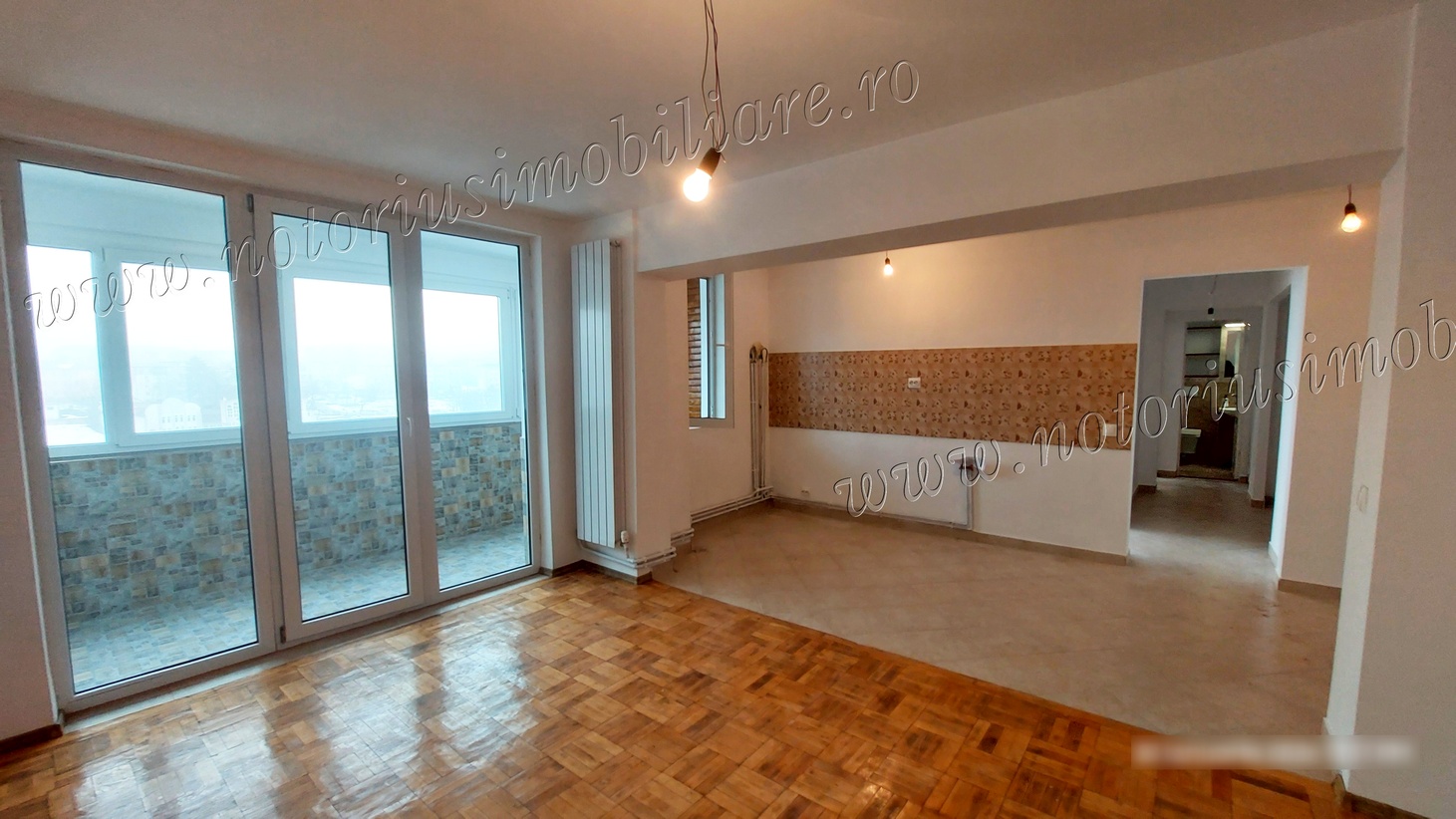 Decomandat și complet renovat cu vedere panoramică în bloc turn, anvelopat: Micro 4, Bd. M Viteazu.