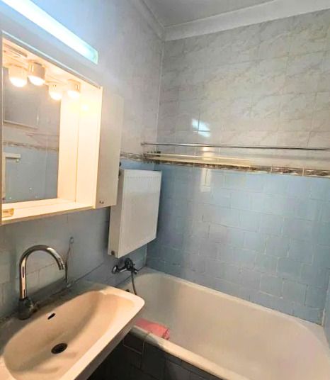 UN APARTAMENT PENTRU CEI CARE S-AU SĂTURAT DE SPAȚII ÎNGHESUITE — fotografia 4