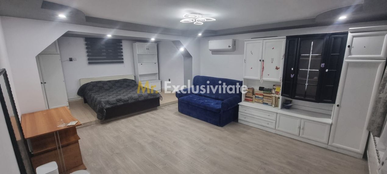 Casă P+M cu 1.558 mp teren, livadă și garaj — fotografia 4
