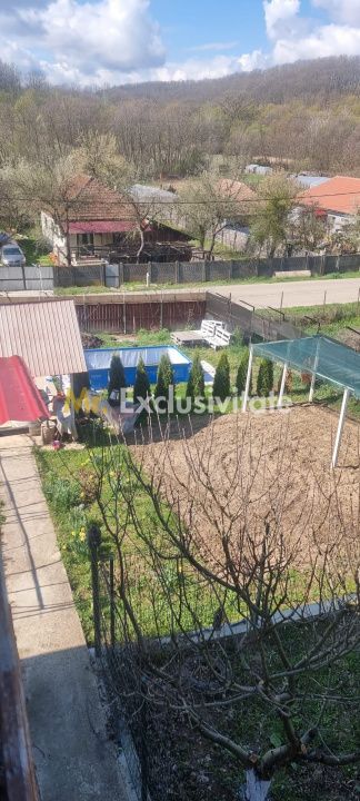 Casă P+M cu 1.558 mp teren, livadă și garaj — fotografia 5