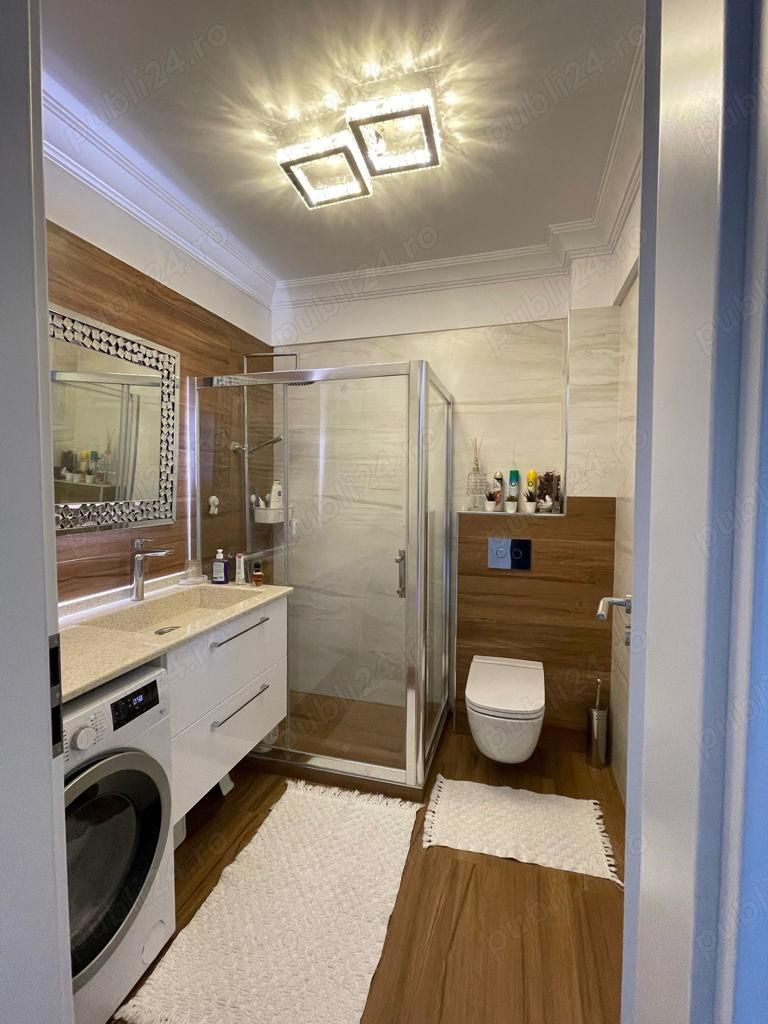Casă 3 camere 2 băi și curte 75 mp finisată și mobilată lux — fotografia 2