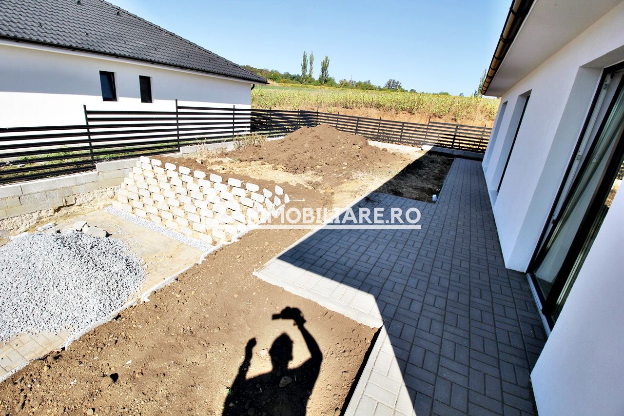 Casa pe 1 nivel,4 camere,2 bai,110 mp.1 dressing,500mp teren — fotografia 13