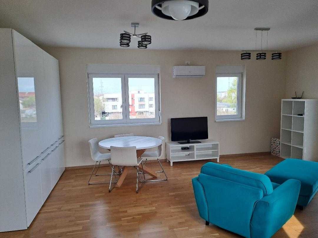 Apartament 3 camere, mobilat, utilat si parcare, zonă premium — fotografia 2