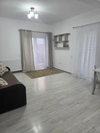 De vanzare Unirii,apartament cu 2 camere,parter,open space,mobilat si utilat,bloc nou, cu loc de parcare inclus