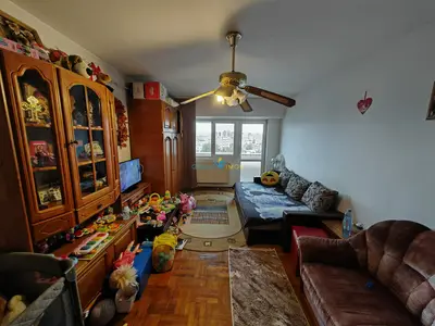 2 camere decomandate, Banca Națională