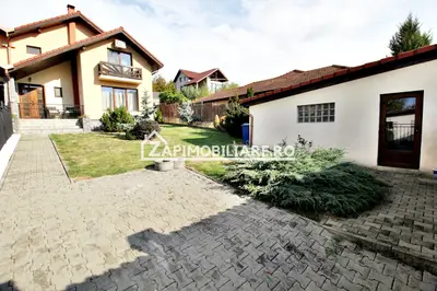 Casa 3 camere, 2 bai,1 garaj,teren 360 mp.zona Dambu Pietros